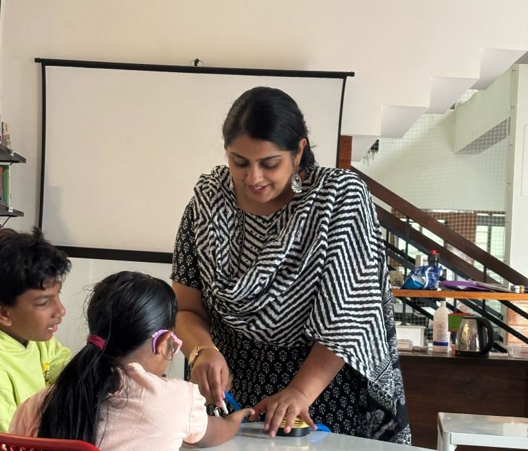 Facilitator guiding learners through a hands-on activity